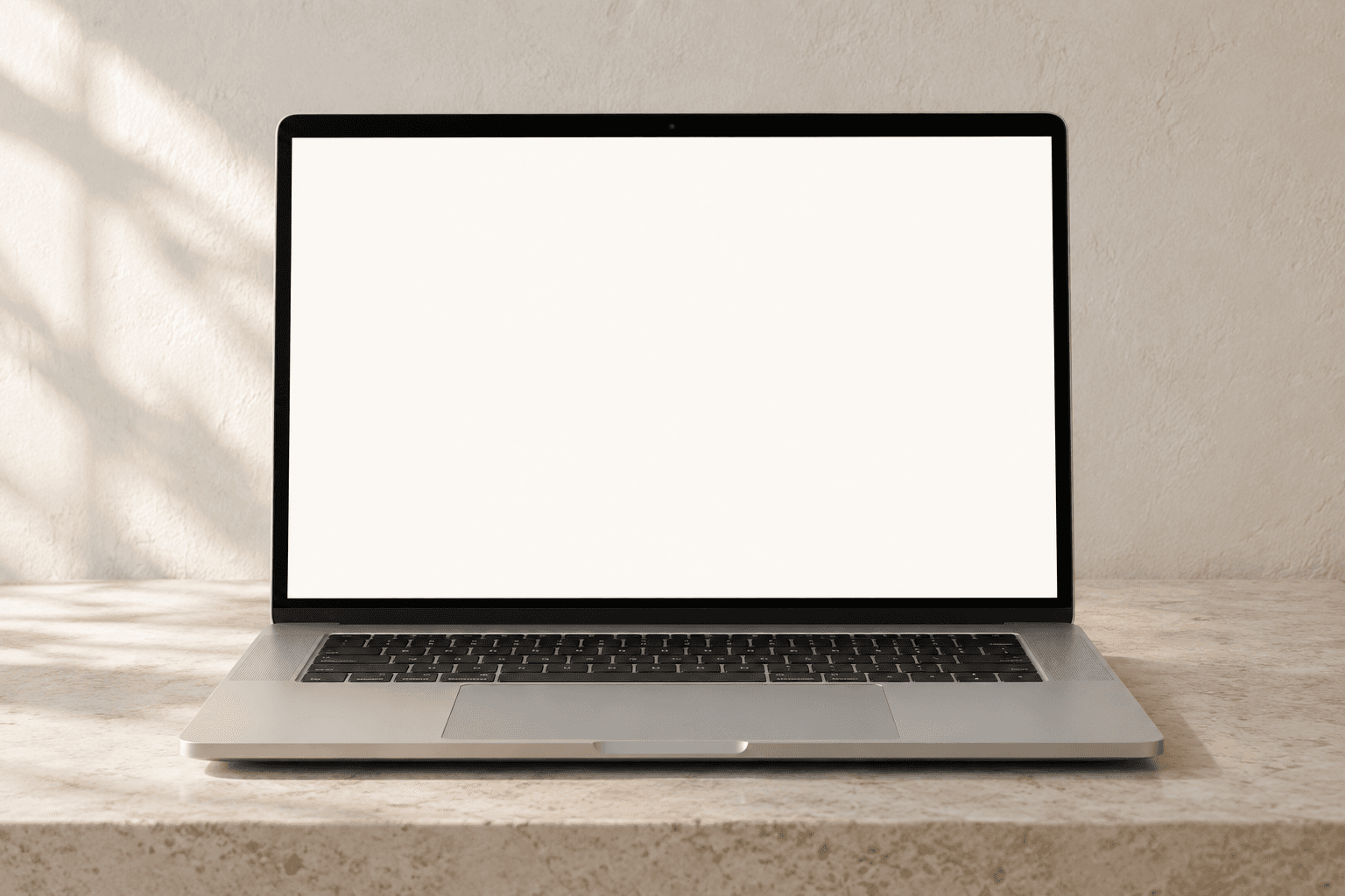 A countdown email displayed on a laptop on a sunlit desk